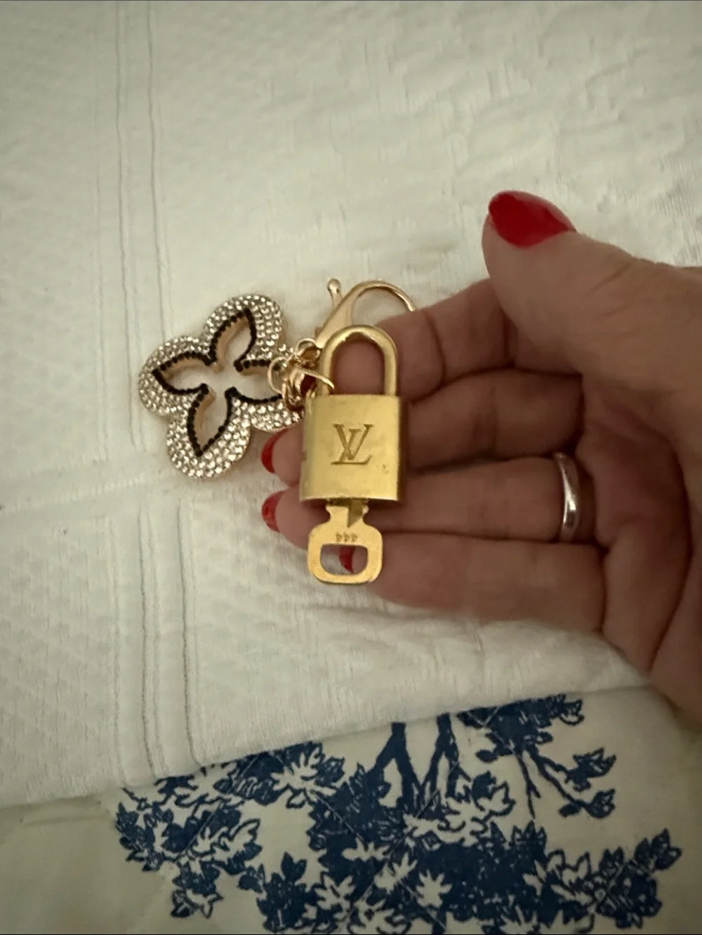 Louis Vuitton lock and key with unbranded gold and White Crystal Flower Charm